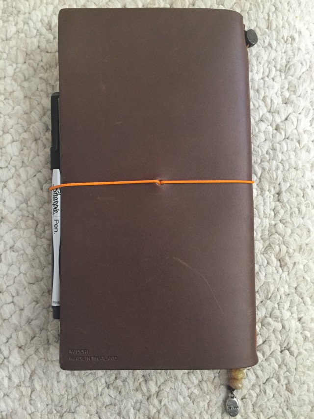 Midori Travelers Notebook, back strap view, sharpie pen
